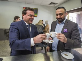 Current Toronto City Councillor Giorgio Mammoliti meets supporters - among them - long time conservative organizer Ron Chatha, at the Brampton Sports Cafe in Brampton, Ont. on Saturday March 24, 2018.  Mammoliti kicked off his campaign seeking the Ontario PC nomination for the riding of Brampton Centre. Ernest Doroszuk/Toronto Sun/Postmedia Network