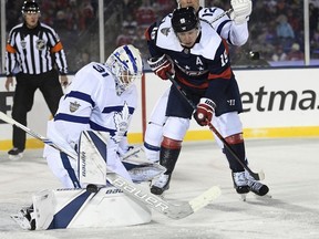 Toronto Maple Leafs goaltender Frederik Andersen (31), of Denmark, looks for the puck against Washington Capitals center Nicklas Backstrom (19), of Sweden, during the second period of an NHL hockey game, Saturday, March 3, 2018, in Annapolis, Md.