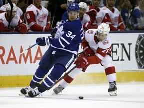 Detroit Red Wings; Dylan Larkin trips up Toronto Maple Leafs' Auston Matthews during NHL action on March 24, 2018