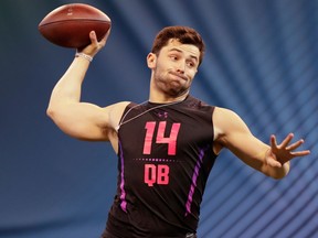 Oklahoma quarterback Baker Mayfield throws during a drill at the NFL football scouting combine in Indianapolis on March 3, 2018