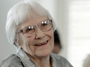 FILE - In this Aug. 20, 2007 file photo, author Harper Lee smiles during a ceremony honoring the four new members of the Alabama Academy of Honor at the Capitol in Montgomery, Ala. The estate of "To Kill a Mockingbird" author Lee has filed suit over an upcoming Broadway adaptation of the novel set to open in Dec. 2018. The federal lawsuit filed this week in Alabama argues that screenwriter Aaron Sorkin's script wrongly alters Atticus Finch and other characters from the book.