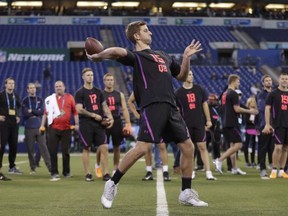 UCLA quarterback Josh Rosen throws during a drill at the NFL football scouting combine in Indianapolis, Saturday, March 3, 2018.