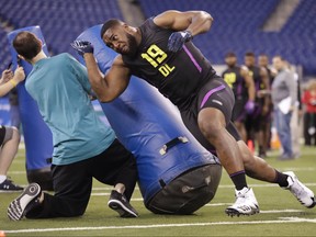 Fort Hays State defensive lineman Nathan Shepherd runs a drill at the NFL football scouting combine in Indianapolis, Sunday, March 4, 2018.