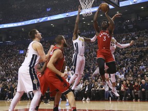 Raptors' OG Anunoby (3) goes in for the slam during first half NBA action against the Nuggets in Toronto on Tuesday, March 27, 2018.