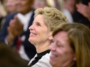 Ontario Premier Kathleen Wynne smiles during a CAMH mental health funding announcement in Toronto on Wednesday March 21, 2018.  THE CANADIAN PRESS/Frank Gunn