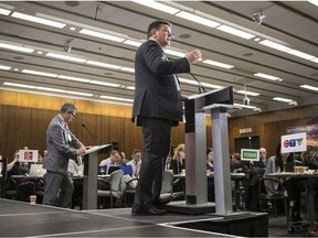 Provincial Finance Minister Charles Sousa takes questions from journalists during a pre-budget lock-up as the Ontario Provincial Government prepares to deliver its 2018 Budget at the Queens Park Legislature in Toronto on Wednesday March 28, 2018.