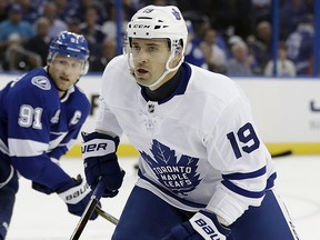 Toronto Maple Leafs centre Tomas Plekanec (19) skates in front of Tampa Bay Lightning centre Steven Stamkos (91) Monday, Feb. 26, 2018, in Tampa, Fla.