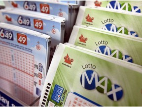 Lotto MAX and Lotto 649 tickets. Theres an unclaimed last week's $64-million 6/49 jackpot on at the OLG headquarters on Tuesday October 27, 2015. Dave Abel/Toronto Sun/Postmedia Network ORG XMIT: POS1610131950541269