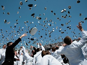 United States Naval Academy Ensigns and 2nd Lieutenants celebrate their graduation by tossing their Midshipmen hats into the air during the ceremony at the Navy-Marine Corps Stadium on May 23, 2008 in Annapolis, Maryland. The Maple Leafs and Washington Capitals are scheduled to play an NHL game at that stadium on March 3, 2018.  (CHIP SOMODEVILLA/Getty Images)