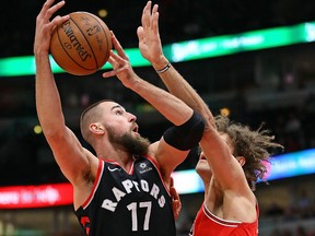 Jonas Valanciunas of the Raptors shoots against Robin Lopez of the Chicago Bulls at the United Center on February 14, 2018 in Chicago. (Jonathan Daniel/Getty Images)