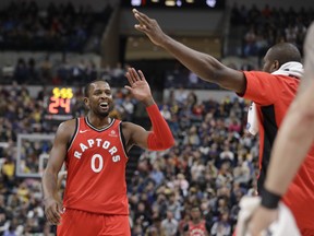 Toronto Raptors' CJ Miles (0) celebrates after hitting a 3-point shot during the second half of an NBA basketball game against the Indiana Pacers, Thursday, March 15, 2018, in Indianapolis. Toronto won 106-99. The Associated Press