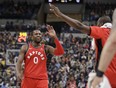 Toronto Raptors' CJ Miles (0) celebrates after hitting a 3-point shot during the second half of an NBA basketball game against the Indiana Pacers, Thursday, March 15, 2018, in Indianapolis. Toronto won 106-99. The Associated Press