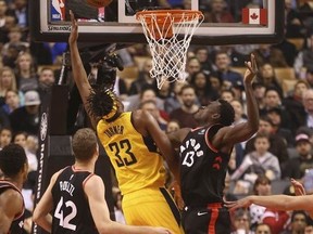 Toronto Raptors Malcolm Miller SF (13) defends against Indiana Pacers Myles Turner C (33) in the first half in Toronto, Ont. on Saturday December 2, 2017.