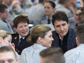 Brenda Lucki, commanding officer of Depot Division, left, and Prime Minister Justin Trudeau, chat over breakfast at RCMP depot in Regina on Thursday January 26, 2017.