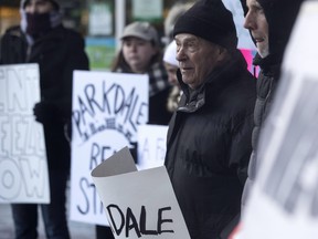 Rent strikers from a rental building at 1251 King Street West and fellow protesters gather outside Social Justices Tribunal Ontario, in Toronto on Friday, February 2, 2018. THE CANADIAN PRESS/Chris Young