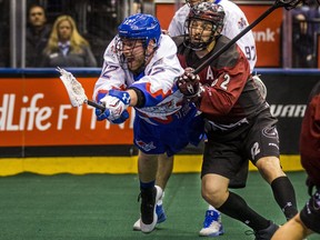 Toronto Rock Dan Taylor and Joey Cupido of the Colorado Mammoth take part in Colorado's 11-7 win over Toronto at the Air Canada Centre in Toronto, Ont. on March 30, 2018. (ERNEST DOROSZUK/Toronto Sun)