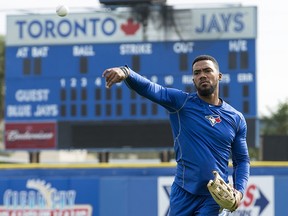 Toronto Blue Jays outfielder Teoscar Hernandez throws during spring training in Dunedin, Fla., on Tuesday, February 13, 2018. (THE CANADIAN PRESS/Frank Gunn)