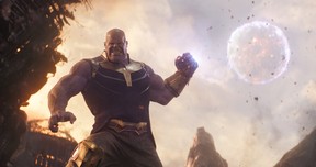 Thanos (Josh Brolin) is seen literally throwing a moon in this still from Avengers: Infinity War. Photo: Film Frame.