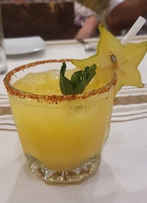 A passion fruit and mezcal cocktail at Vivo Resort’s Ernesto’s restaurant is the perfect happy hour libation. SARAH DOKTOR/POSTMEDIA NETWORK