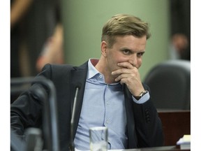 Councillor Joe Cressy listens to city staff a the committee meeting on  the King St. pilot project at City Hall on Monday June 19, 2017. Craig Robertson/Toronto Sun/Postmedia Networkat City Hall on Monday June 19, 2017. Craig Robertson/Toronto Sun/Postmedia Network