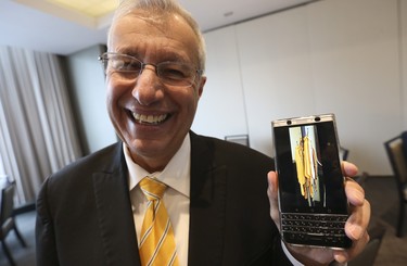 Ontario PC interim leader Vic Fedeli shows off his collection of famous yellow ties at the Ontario PC leadership convention. Fedeli said he will retire the tie he is wearing  on Saturday March 10, 2018. Jack Boland/Toronto Sun/Postmedia Network