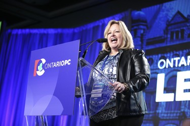 Lisa Thompson rallies the troops as they walk at the drawn out Ontario PC leadership convention on Saturday March 10, 2018. Jack Boland/Toronto Sun/Postmedia Network