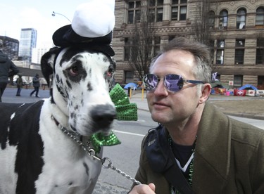 Rory the downtown Dane and his owner Dennis Ilic at the Toronto St Patrick's Day parade on Sunday March 11, 2018. Jack Boland/Toronto Sun/Postmedia Network