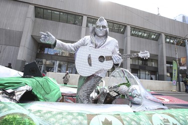 Silver Elvis street muse and musician at the Toronto St Patrick's Day parade on Sunday March 11, 2018. Jack Boland/Toronto Sun/Postmedia Network