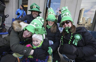 The Morrow family originally from Blackrock, just outside of Dublin, are Steve Morrow and his daughter Kealyn, her cousin Sophie , his wife Celine and their friend Jean (Right) at the parade Toronto St Patrick's Day parade on Sunday March 11, 2018. Jack Boland/Toronto Sun/Postmedia Network