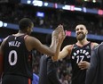 Toronto Raptors center Jonas Valanciunas (17) andToronto Raptors forward CJ Miles (0) in Toronto, Ont. on Friday March 16, 2018. The Toronto Raptors host the Dallas Mavericks at the Air Canada Centre. Veronica Henri/Toronto Sun/Postmedia Network