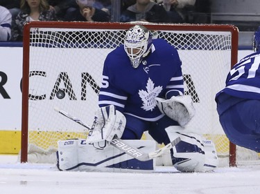 Toronto Maple Leafs Curtis McElhinney G (35) makes a nice save during the first period in Toronto on Saturday March 17, 2018. Jack Boland/Toronto Sun/Postmedia Network