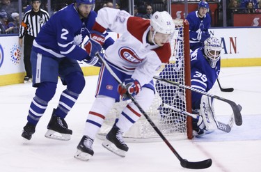 Toronto Maple Leafs Curtis McElhinney G (35) guards the post against Montreal Canadiens Artturi Lehkonen LW (62) during the second period in Toronto on Sunday March 18, 2018. Jack Boland/Toronto Sun/Postmedia Network