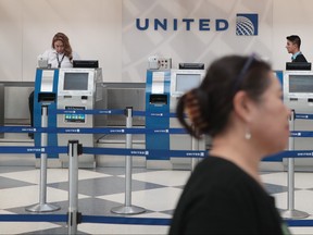 Passengers arrive for flights at the United Airlines terminal at O'Hare International Airport on April 12, 2017 in Chicago, Illinois. (Scott Olson/Getty Images)