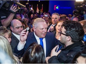 Ontario PC Leader Doug Ford works the crowd at the PC Unity Rally at the Toronto Congress Centre in Toronto, Ont. on Monday March 19, 2018. Ernest Doroszuk/Toronto Sun/Postmedia Network