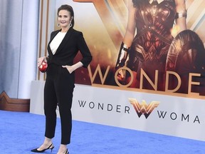 FILE - In this May 25, 2017 file photo, actress Lynda Carter, who starred as Wonder Woman in the TV series, arrives at the world premiere of "Wonder Woman" at the Pantages Theatre in Los Angeles.