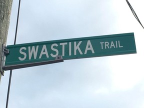 A sign is seen for "Swastika Trail" in Puslinch Township in this November 2017 handout photo. A street in southern Ontario will retain the name "Swastika Trail" after Puslinch Township council voted 4-1 against changing the privately owned street name during a meeting on Wednesday evening.