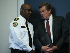 Police Chief Mark Saunders and Mayor John Tory at a press conference on April 24.(JACK BOLAND, Toronto Sun)