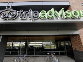 TripAdvisor’s logo is seen on a sign at the company’s headquarters on Nov. 2, 2017, in Needham, Mass.
