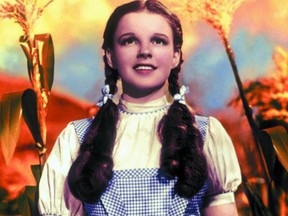 Judy Garland in the iconic Wizard of Oz. Her late husband claims in a re-released book that she was sexually molested by "drunk" Munchkins.