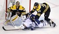 Boston Bruins defenceman Zdeno Chara hits Toronto Maple Leafs centre Zach Hyman during Wednesday night's game. (AP PHOTO)