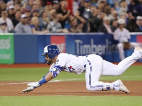 The Toronto Blue Jays sent Devon Travis down to triple-A on Sunday. (GETTY IMAGES)