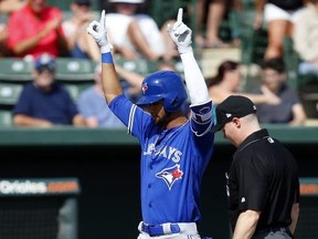 Lourdes Gurriel #13 of the Toronto Blue Jays celebrates after hitting a three-run home run in the seventh inning against the Baltimore Orioles in a spring training game on March 8, 2017 at Ed Smith Stadium in Sarasota, Florida.  (Photo by Justin K. Aller/Getty Images)