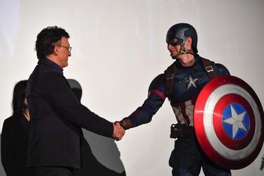 TOKYO, JAPAN - APRIL 16: Film Director Anthony Lusso and Captain America attend the fan event for 'Avengers Infinity War' Tokyo premiere at the TOHO Cinemas Hibiya on April 16, 2018 in Tokyo, Japan.  (Photo by Koki Nagahama/Getty Images for Disney)