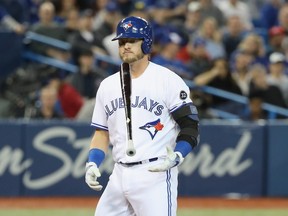 Josh Donaldson #20 of the Toronto Blue Jays reacts after striking out in the ninth inning during MLB game action against the New York Yankees at Rogers Centre on March 30, 2018 in Toronto, Canada. (Photo by Tom Szczerbowski/Getty Images)