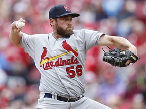 Greg Holland of the St. Louis Cardinals pitches in the eighth inning of the game against the Cincinnati Reds at Great American Ball Park on April 14, 2018 in Cincinnati, Ohio. The Cardinals defeated the Reds 6-1. (Photo by Joe Robbins/Getty Images)