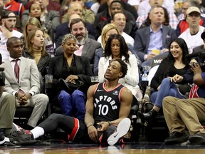 WASHINGTON, DC - APRIL 20: DeMar DeRozan #10 of the Toronto Raptors sits on the floor after getting called for a foul in the second half against the Washington Wizards during Game Three of Round One of the 2018 NBA Playoffs at Capital One Arena on April 20, 2018 in Washington, DC. NOTE TO USER: User expressly acknowledges and agrees that, by downloading and or using this photograph, User is consenting to the terms and conditions of the Getty Images License Agreement. (Photo by Rob Carr/Getty Images)