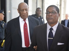Actor and comedian Bill Cosby (C) comes out of the courthouse after the verdict in the retrial of his sexual assault case at the Montgomery County Courthouse in Norristown, Pennsylvania on April 26, 2018. Disgraced television icon Bill Cosby was convicted of sexual assault. AFP PHOTO/Dominick Reuter