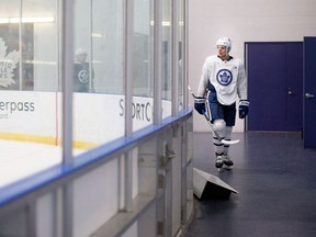 Toronto Maple Leafs centre Auston Matthews looks back onto the ice as he makes his way to the locker room after a practice session in Toronto on April 9, 2018