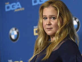 Amy Schumer poses in the press room at the 70th annual Directors Guild of America Awards at The Beverly Hilton hotel on Saturday, Feb. 3, 2018, in Beverly Hills, Calif. (THE CANADIAN PRESS/Photo by Chris Pizzello/Invision/AP)