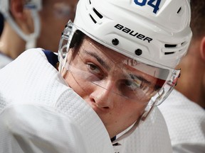 Auston Matthews of the Toronto Maple Leafs watches the first period against the New Jersey Devils at the Prudential Center on April 5, 2018